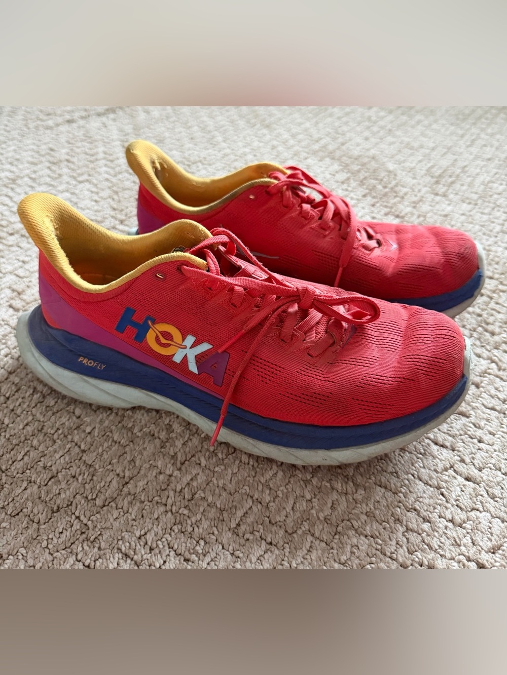 Hoka Mach 4 Men’s 9.5 Coral Red Running Shoes with Blue & Yellow Accents
